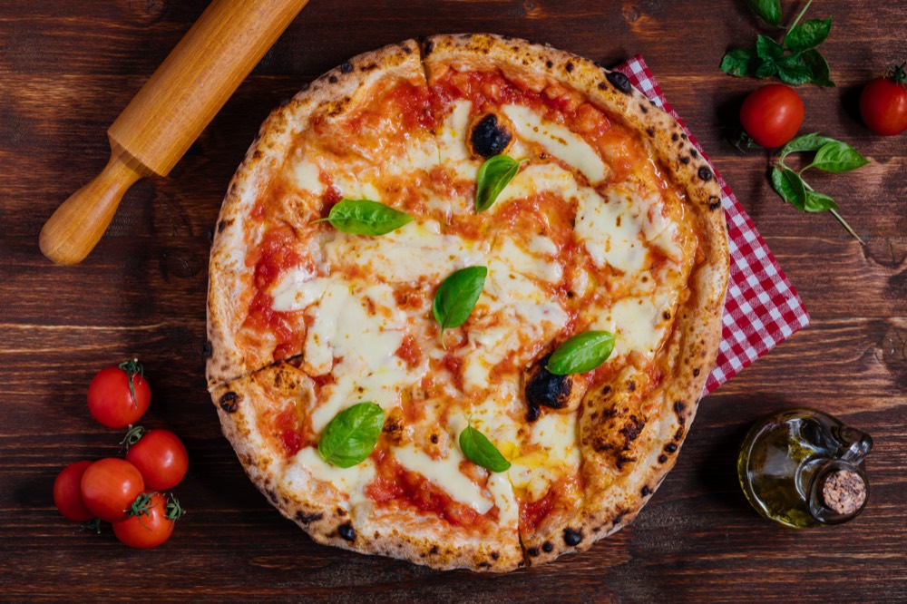 Wood-fired Margherita pizza, the kind of dish guests order direct from your own branded site.